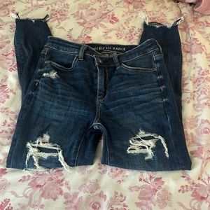 American Eagle jeans and has rips but they are covered! they are skinny, size 4